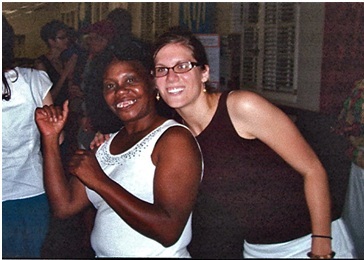 Sara-Kay Knicely ’09 with homeless friend at Urban Ministry Center in Charlotte