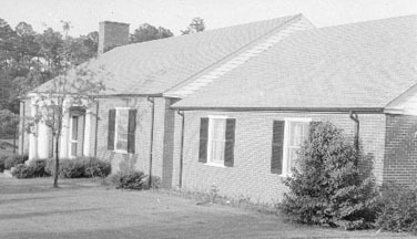 Exterior shot of a Patterson Court house [1985]