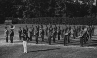 A picture of members of the first ROTC band at a parade rest