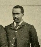 Holtzclaw, a black man dressed formally in a jacket and tie