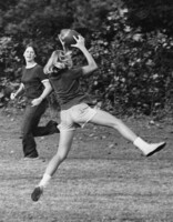 Two women playing the first female flickerball game in 1974.