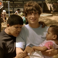 David Baker ’11 with children at Pajaritos Azul, a home for disabled children in Mangua, 2008