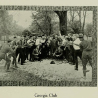 The Georgia club stands with rifles next to a lynched Black man