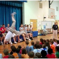 Landry Kosmalski entertains the children at Davidson Elementary, ‘10
