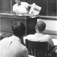 Chalmers in front of a class