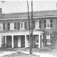The president's house pictured from the front in 1894. A black woman can be seen on the front porch.